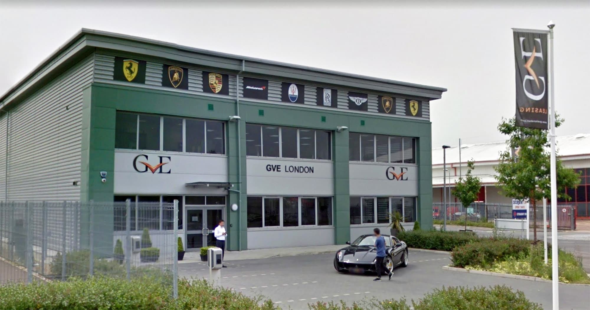 crowd of customers gathered outside GVE London dealership at Trade City Business Park