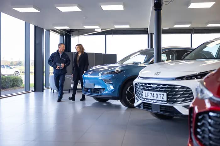 graph showing car dealer pay growth flattening and staff turnover falling to 25%