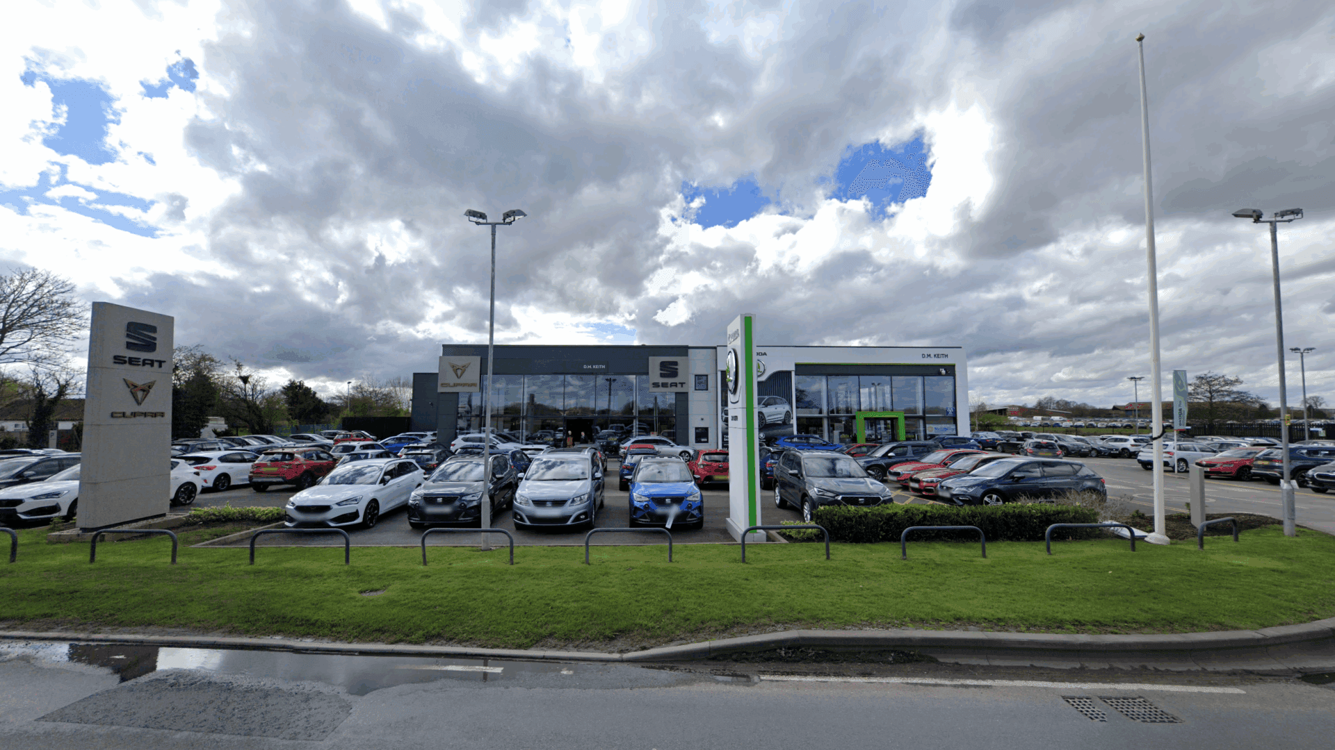 showroom displaying new and used vehicles at D.M. Keith dealership