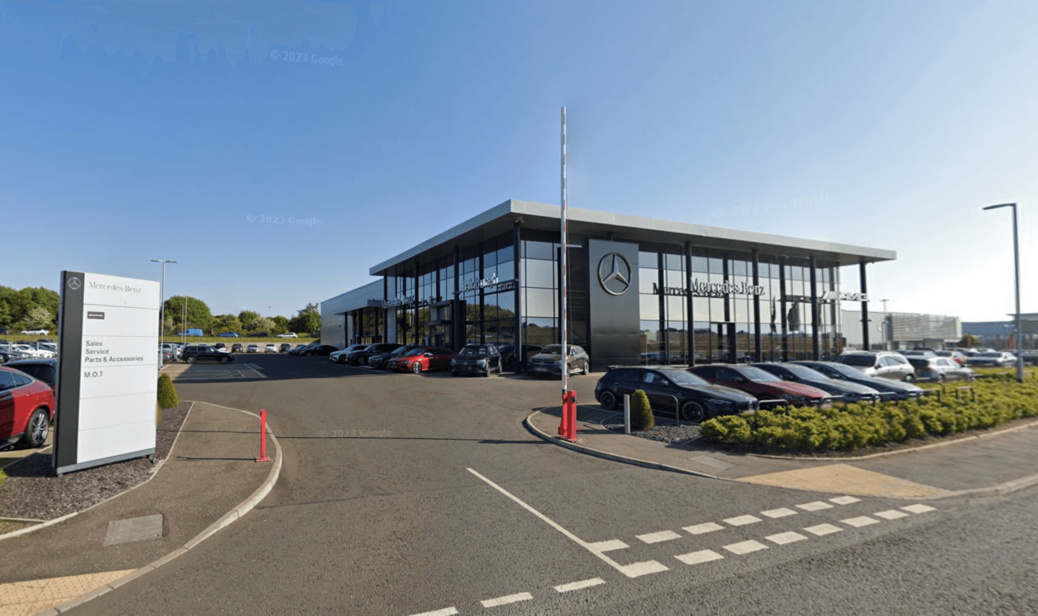 Eastern Western Motor Group showroom displaying a mix of Mercedes, BMW and new Chery vehicles