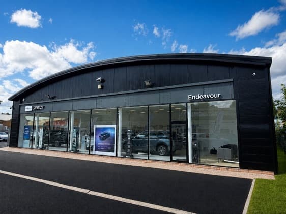 Showroom floor displaying vehicles from the newly added brand