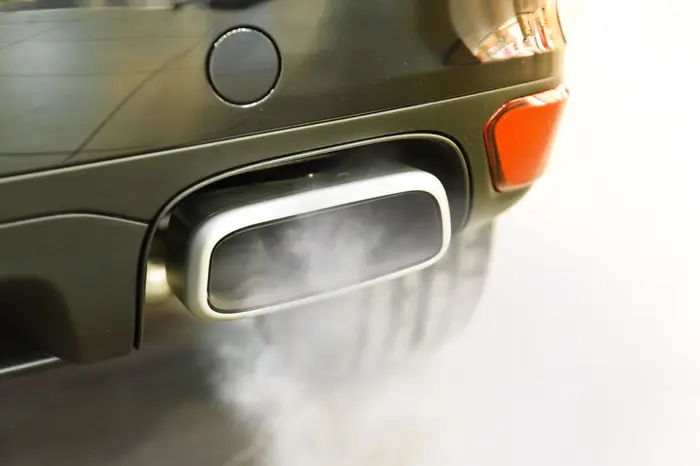 European Parliament chamber with negotiators discussing car emissions rules