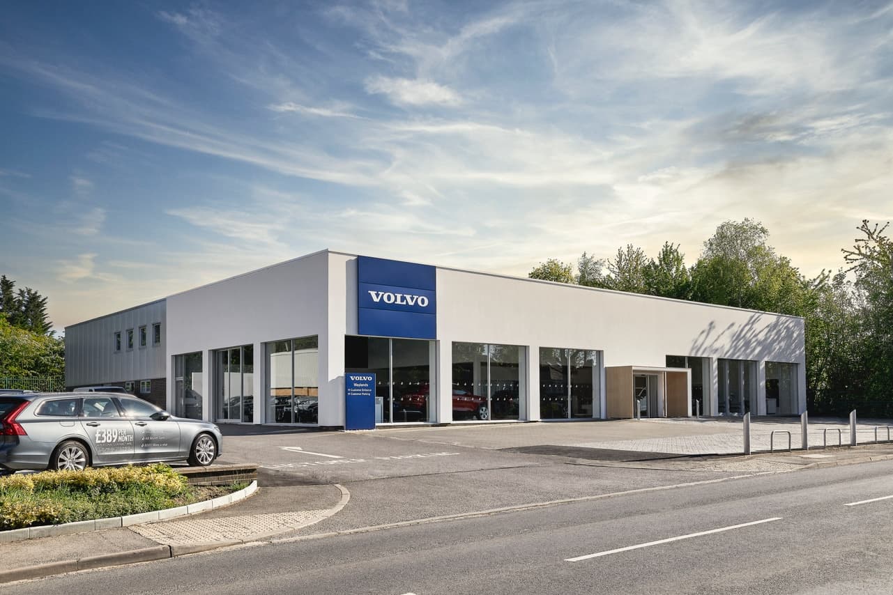 Waylands dealership showroom in Reading displaying a range of new cars