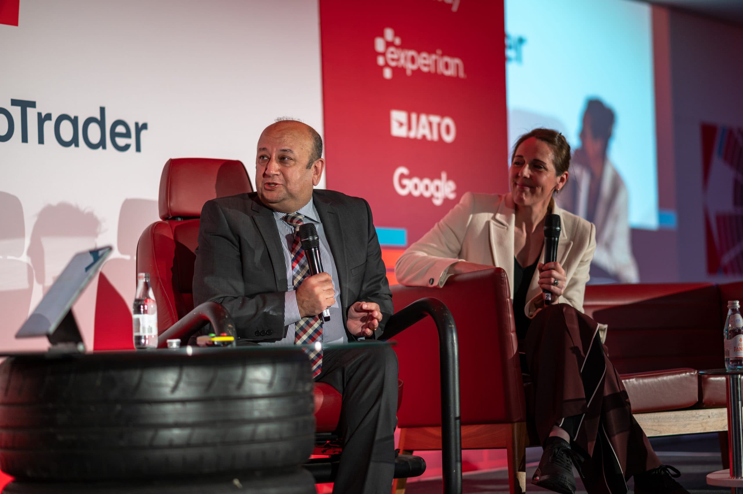 Daksh Gupta standing beside Rachel Clift at Car Dealer Live 2025