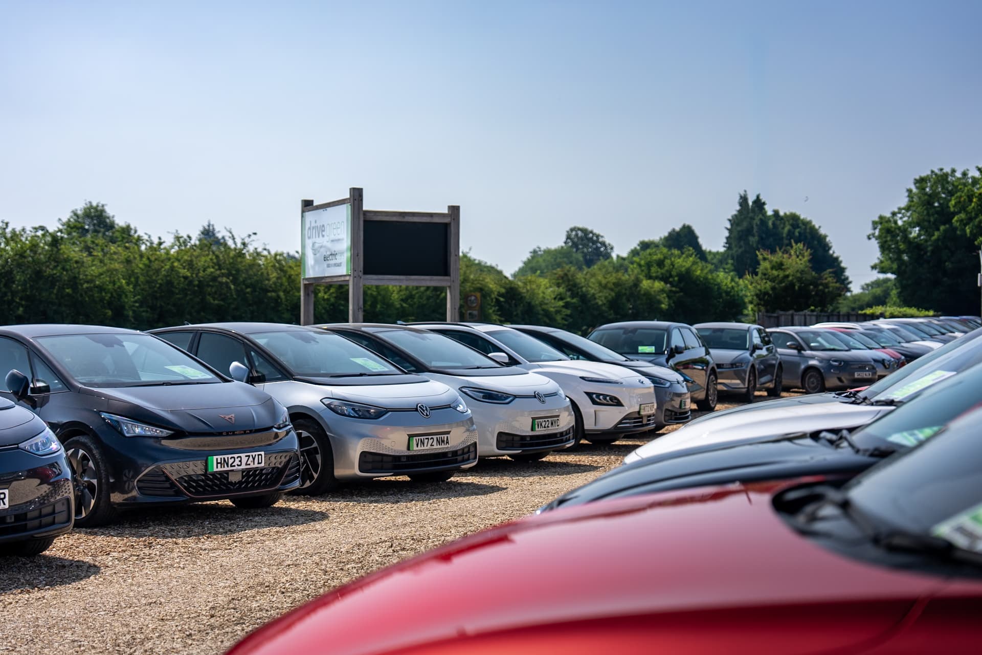 Independent car dealer showroom displaying electric vehicles