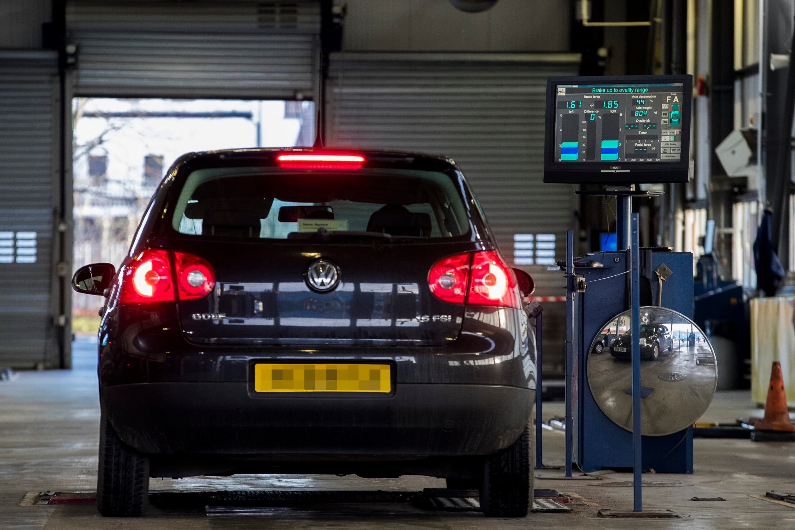 Why is the Independent Garage Association pushing for higher MOT fees?