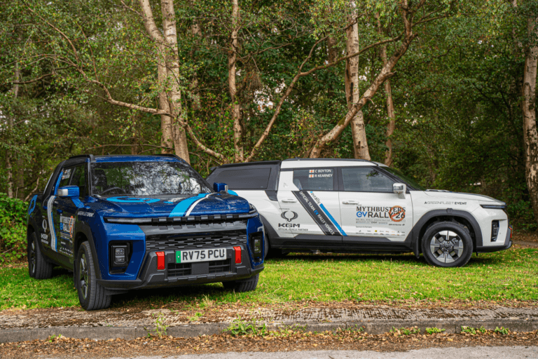 KGM Musso electric pickup truck displayed at a motor show