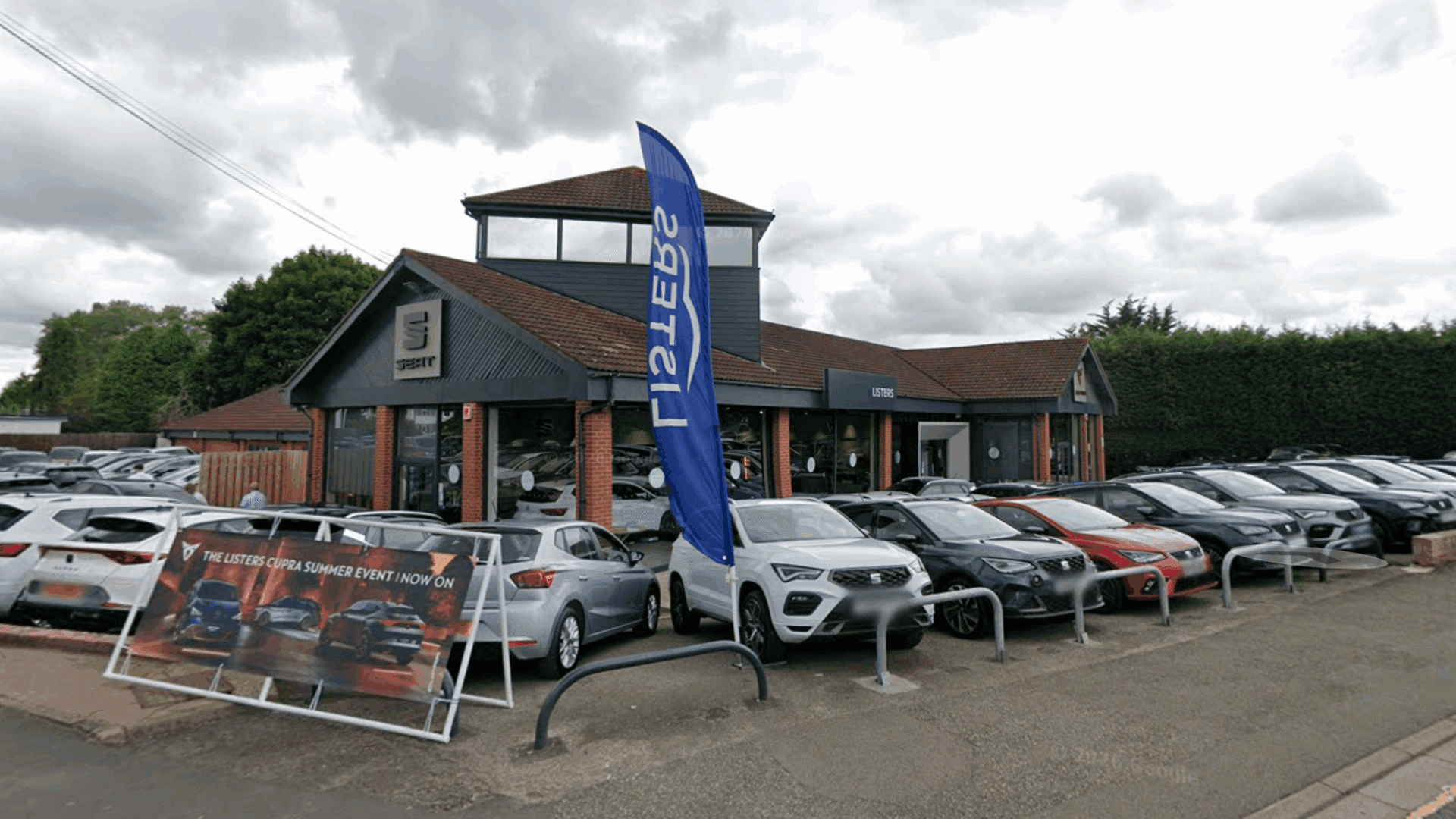 Why did Listers Group profits fall 15% after moving to agency agreements?