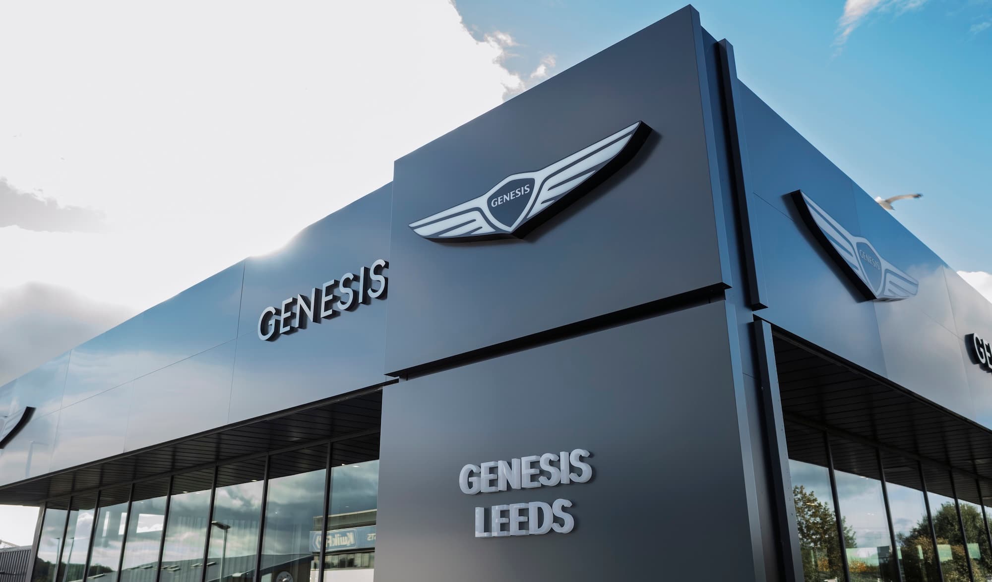 Glass‑fronted Genesis Leeds showroom on Gelderd Road