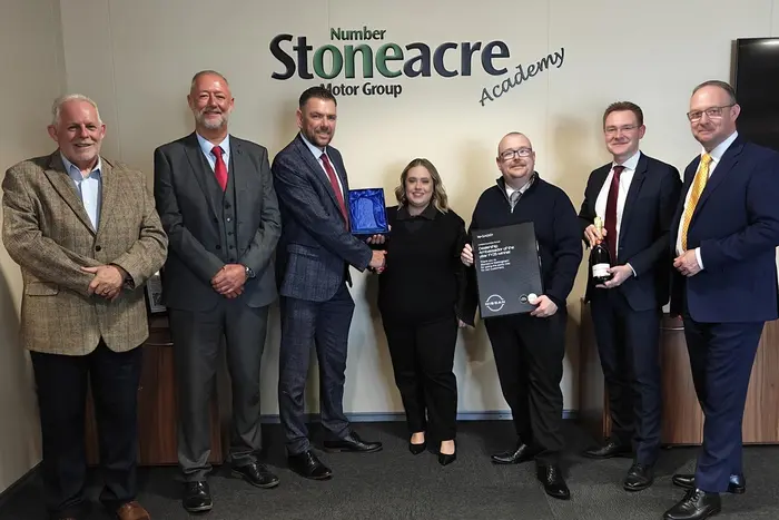 Stoneacre Nottingham dealership receiving Nissan Dealer Ambassador award