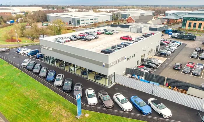Sytner Group showroom with new vehicles on display