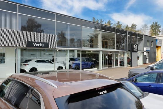 Vertu Motors showroom with new and used vehicles on display