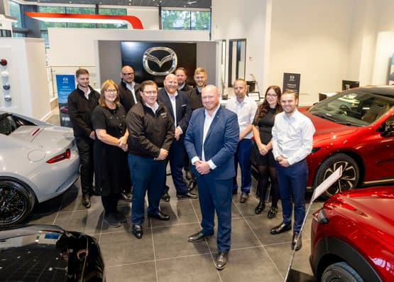 Dual‑brand Sheffield showroom displaying Mazda and Nissan vehicles